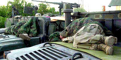 Brian Horn's regiment spent nearly a year finding places to sleep on the ground or on their vehicles while behind enemy lines in Northern Iraq. From Life in Iraq, Stars and Stripes special report on morale. October, 2003, Jon R. Anderson, Stars and Stripes
